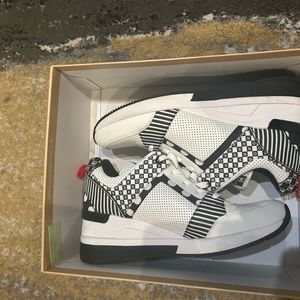 Must have Michael Kors White and Black sneakers!